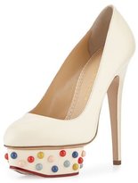 white pumps with studs