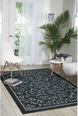 https://img.shopstyle-cdn.com/sim/8c/46/8c464167e2b6d72cbed4f78ef9151be7_xlarge/anemone-abstract-indoor-outdoor-area-rug-in-black.jpg