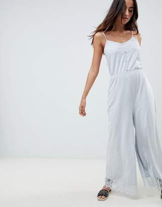 ASOS Design Cami Jersey Jumpsuit With Lace Trim And Button Front