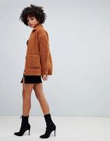 Thumbnail for your product : Missguided oversized pocket detail borg jacket in rust