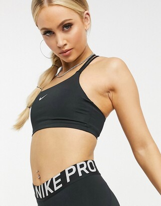 Nike Training Indy light support sports bra in black - ShopStyle