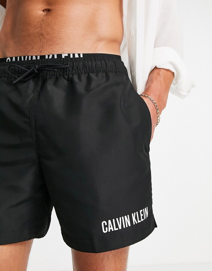 Calvin Klein swim shorts with double logo waistband in black - ShopStyle
