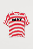 designer graphic tees womens