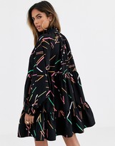 Thumbnail for your product : ASOS DESIGN tiered swing mini shirt dress in abstract print