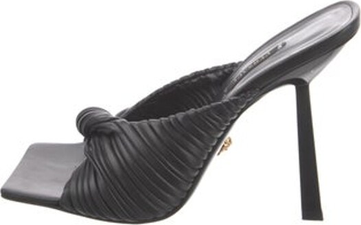 Versace Leather Slides Black Includes Box & Dust Bag Unfortunately, due to restrictions, this item may not be eligible for shipping in all areas.