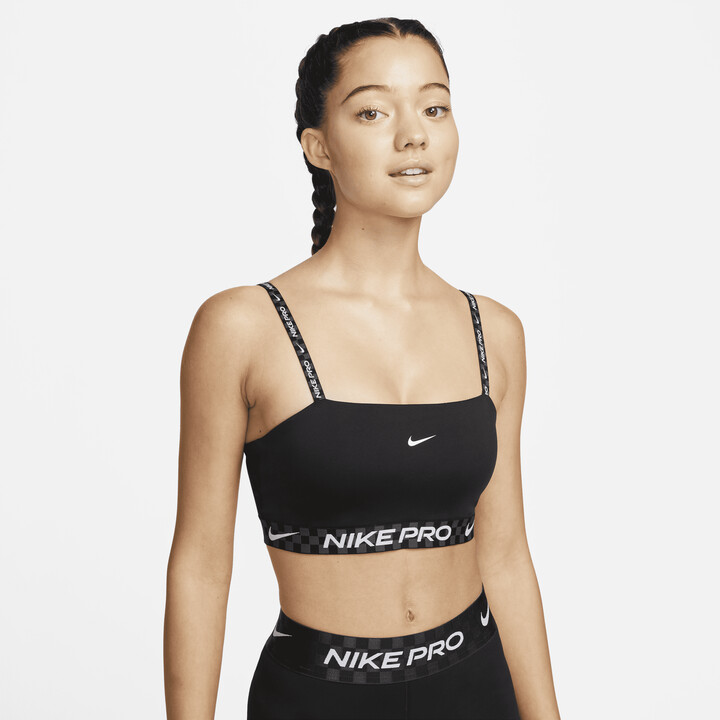 Nike Training Dri-FIT Pro Indy Strappy all over print light-support padded  sports bra in dark gray