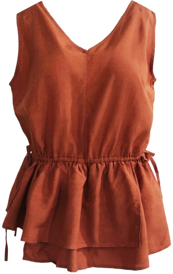 burnt orange peplum top