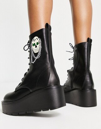 Koi Footwear Koi skull lace up platform boots in black