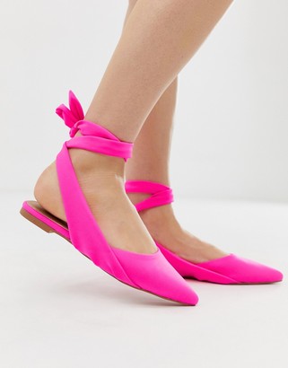ASOS DESIGN Laser tie leg ballet flats in neon pink