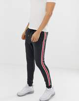 Thumbnail for your product : ASOS Design DESIGN super skinny joggers with side stripe in charcoal-Grey