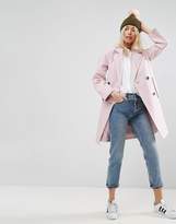 Thumbnail for your product : ASOS Design Khaki With Pink Faux Fur Pom Beanie