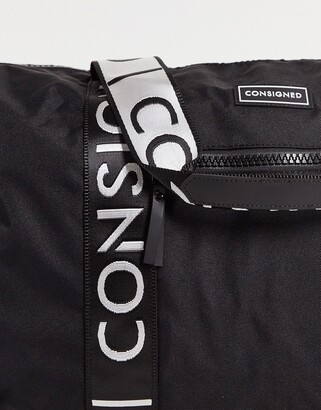 Consigned taped holdall in black