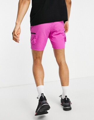 ASOS DESIGN slim nylon shorts with cargo pockets in hot pink