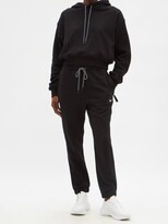 Thumbnail for your product : Reebok x Victoria Beckham Logo-embroidered Cotton-jersey Track Pants - Black