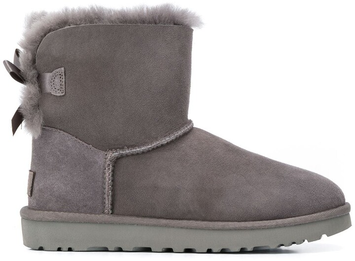 black ugg boots with white fur