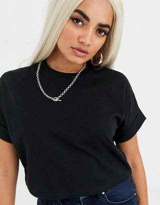 ASOS DESIGN Petite crop t-shirt with roll sleeve in black