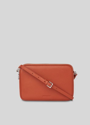 rust coloured clutch bag