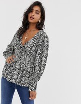 Thumbnail for your product : ASOS DESIGN plunge top in zebra animal print with shirred waist