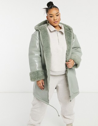 ASOS Curve DESIGN Curve leather look parka with borg lining in sage