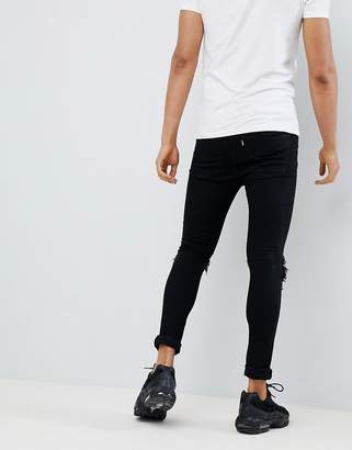 Jaded London super skinny jeans with rips in black