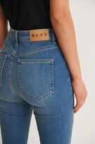 Thumbnail for your product : NA-KD Skinny High Waist Raw Hem Jeans Petite