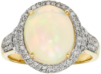 The Regal Collection 14k Gold Opal & 5/8 Carat T.W. Diamond Halo Ring