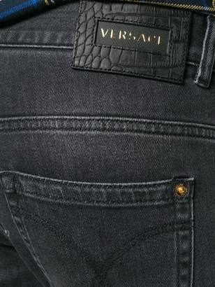 Versace faded slim-fit jeans