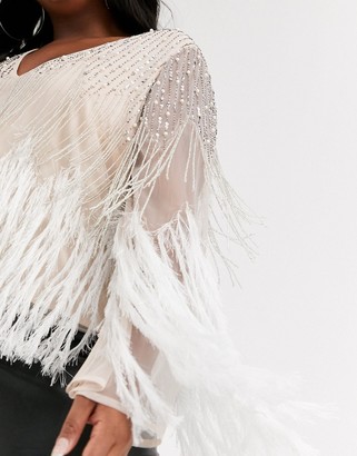 ASOS DESIGN Curve long sleeve embellished top with faux feather trim