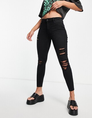 New Look high waist ripped skinny jeans in black - ShopStyle