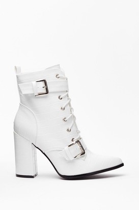 white booties with buckles