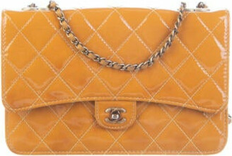Authentic Chanel CC Eyelet Flap Bag