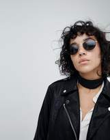 Thumbnail for your product : ASOS Design 90S Small Oval Sunglasses In Black With Silver Metal Nose Bridge