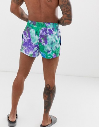 ASOS DESIGN swim shorts with purple tie dye in super short length