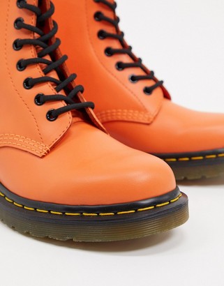 Dr. Martens 1460 leather flat ankle boots in orange