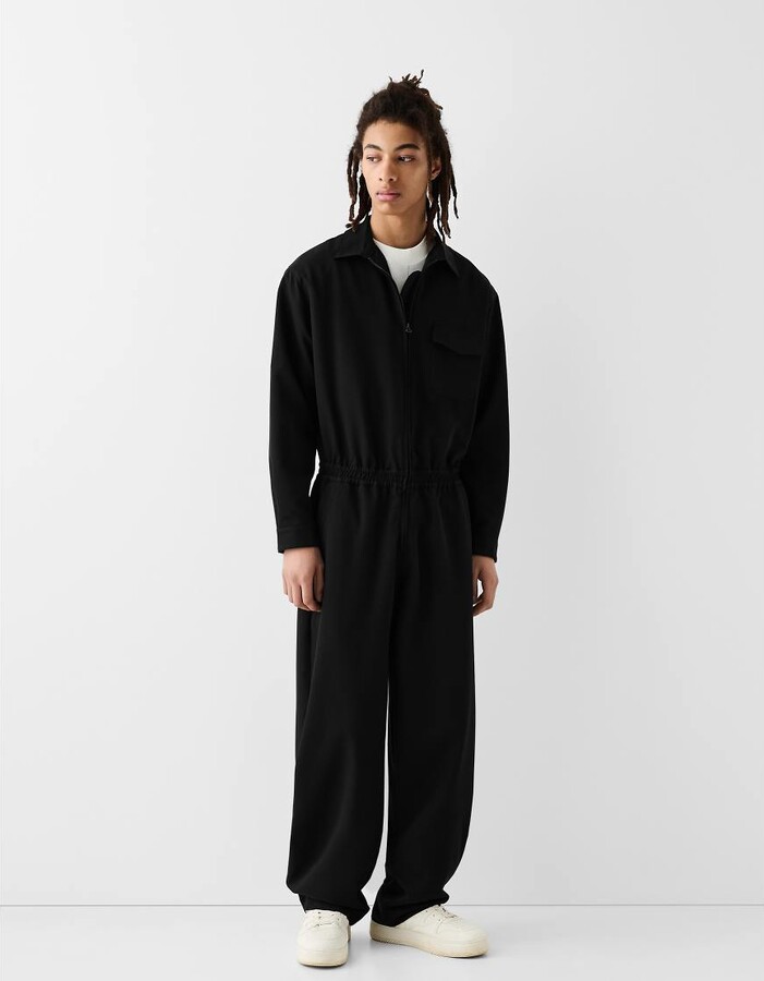 Bershka Collection zip up jumpsuit in black ShopStyle Casual Jackets