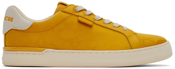 yellow coach shoes