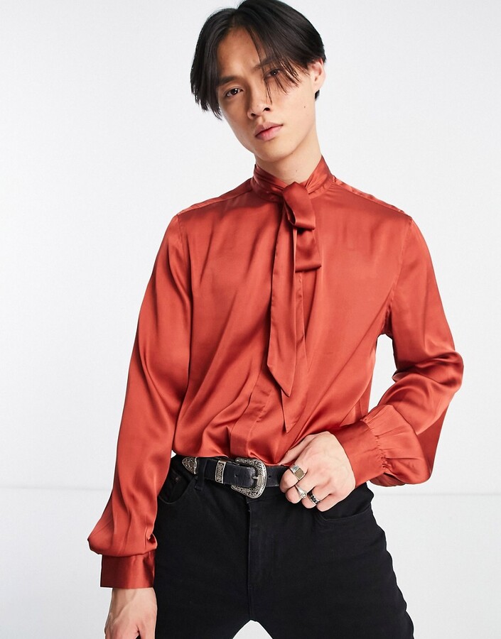 ASOS DESIGN satin shirt with tie neck and blouson volume sleeve in brick red  - ShopStyle