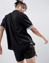 Thumbnail for your product : ASOS DESIGN festival oversized shirt with pom pom & geo-tribal detail sleeve