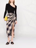 Thumbnail for your product : KHAITE Louie draped check-print skirt