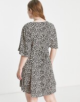 Thumbnail for your product : ASOS Curve ASOS DESIGN Curve button through tie back mini tea dress with angel sleeve in animal print