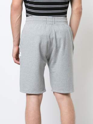 Reigning Champ midweight terry track shorts
