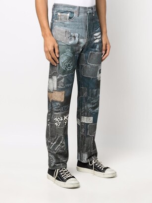 Doublet mid-rise graphic-print Jeans - Farfetch