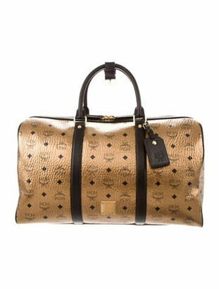 gold mcm duffle bag
