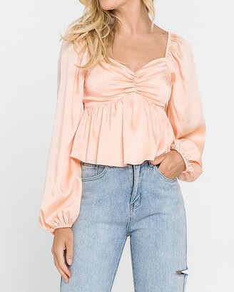 coral peplum top