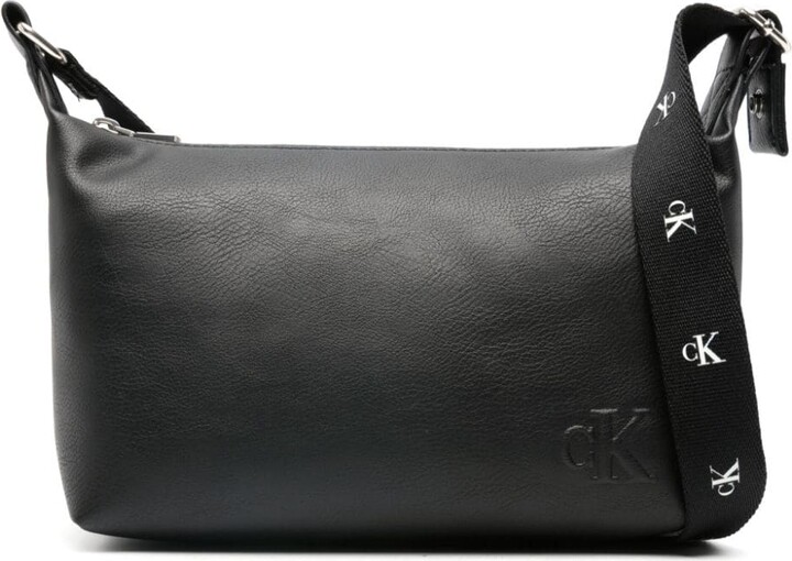 Calvin Klein MUST PHONE POUCH EMBOSSED - Phone case - black