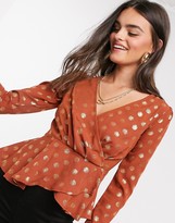 black blouse with gold polka dots