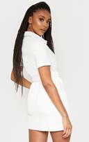 Thumbnail for your product : PrettyLittleThing Cream Cord Zip Front Belted Dress