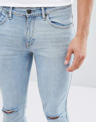 MANGO Man Skinny Jeans With Rips In Light Wash