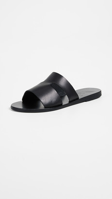 black flat mule slides