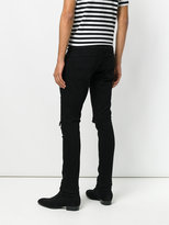 Thumbnail for your product : Amiri distressed skinny jeans